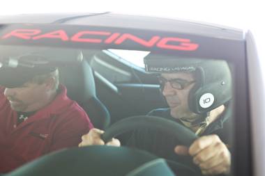 Las Vegas Sun writer John Katsilometes in the Aston Martin VantGE S before heading out on to the track at Exotics Racing Las Vegas, Thursday Oct. 15, 2012.